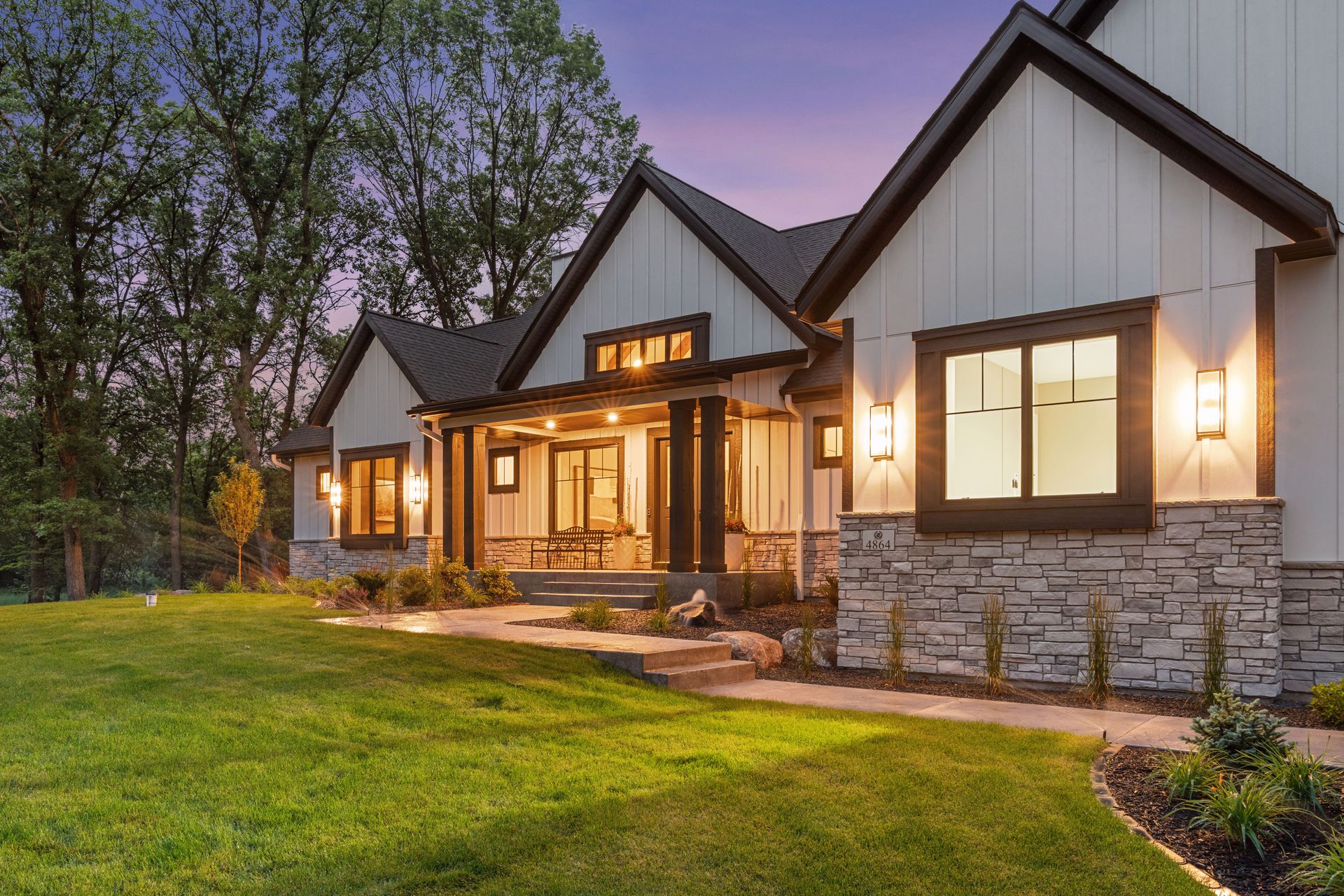 Home beautifully illuminated at dusk